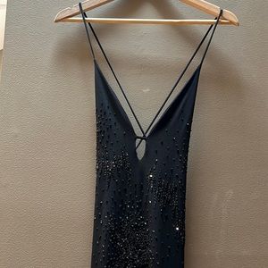 Floor length beaded shief dress.